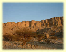 The Jebel Qatar cliffs at sunset