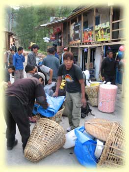 Packing the dokos at the start of the trek.